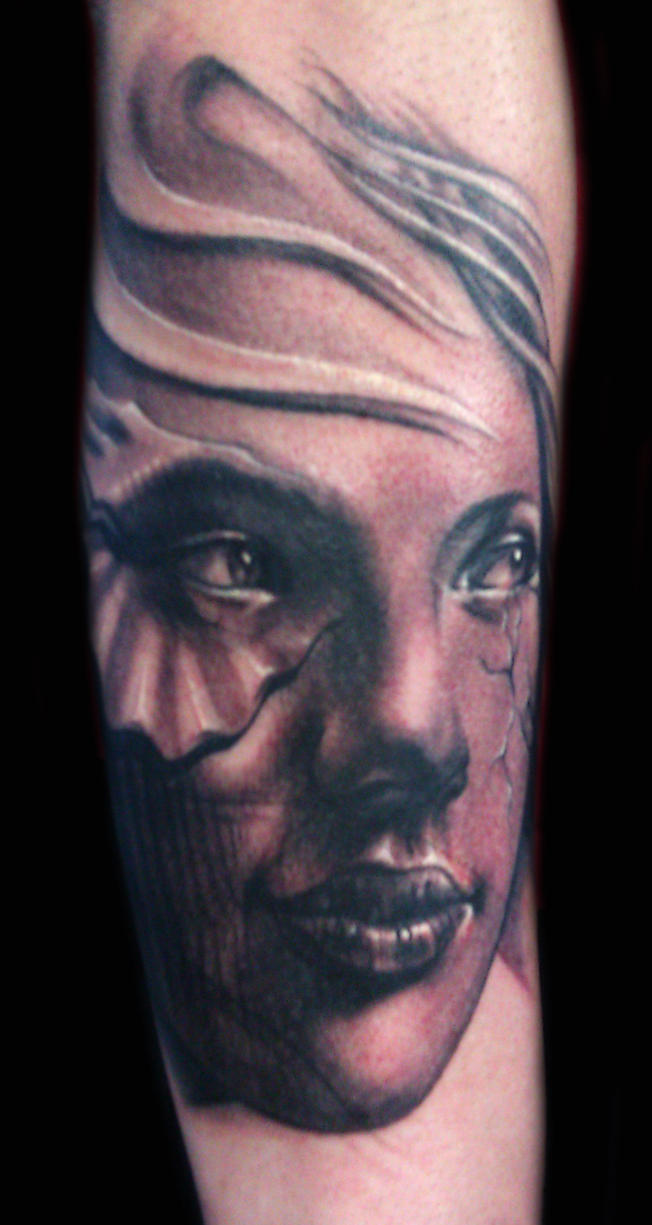 Freehand girl face tattoo by